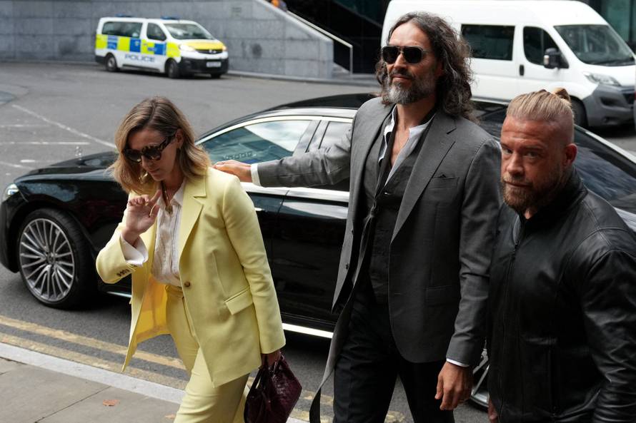 Russell Brand appears at Southwark Crown Court for a two-day pre-trial hearing, in London