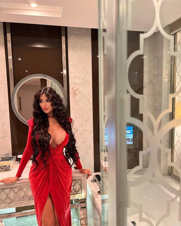 EXCLUSIVE: ‘Surgery-addicted’ model who has spent $1m to look like Kim Kardashian shares stark warning after breast implant BURSTS