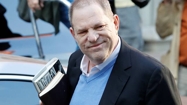 Film producer Harvey Weinstein arrives at the 1st Precinct in Manhattan in New York