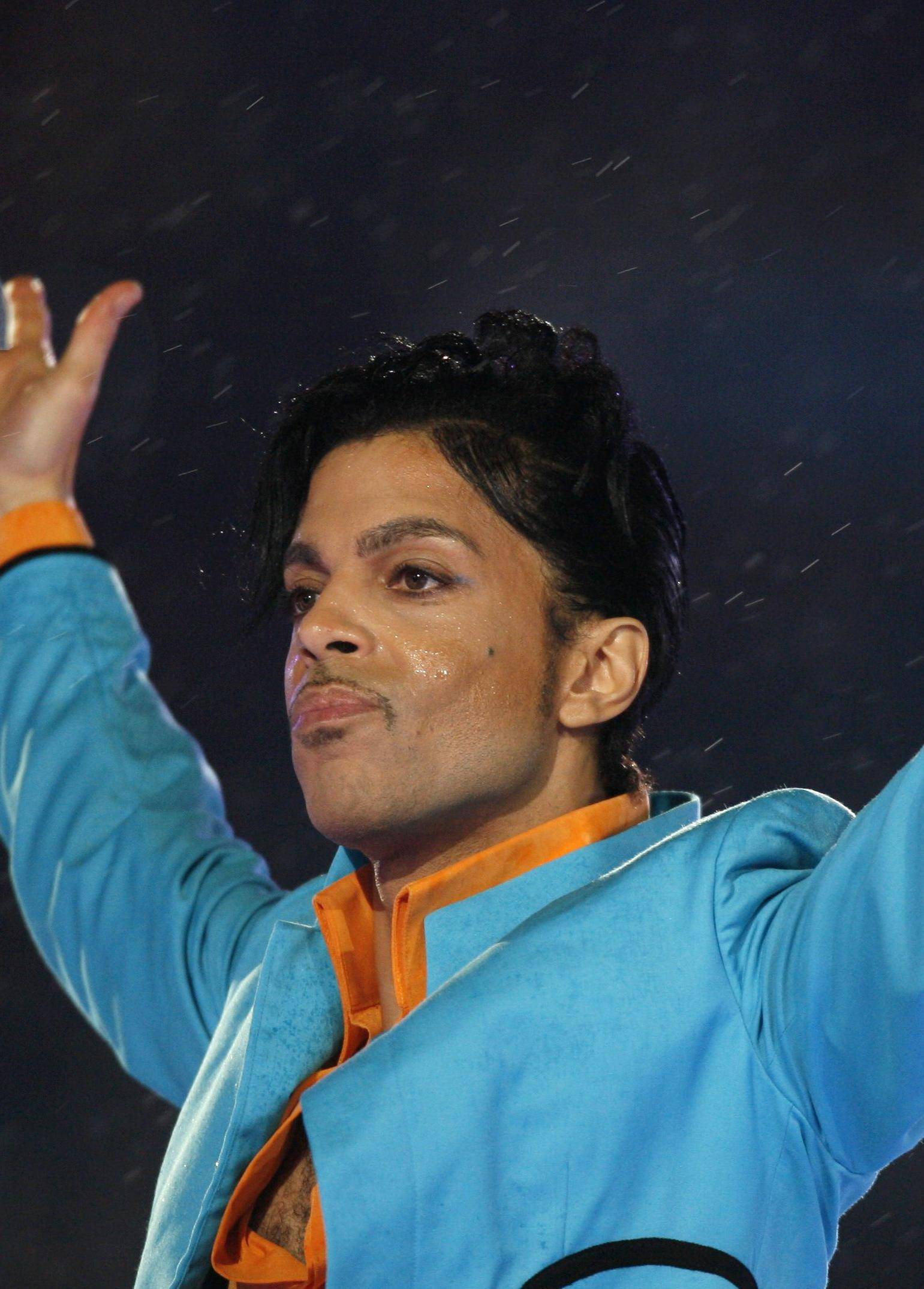 Prince performs during halftime show of the NFL's Super Bowl XLI football game between the Colts and the Bears in Miami