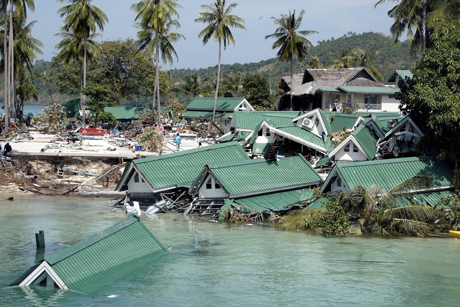 FILE PHOTO: Submerged buildings near the pier at Ton Sai Bay in Thailand's Phi Phi island