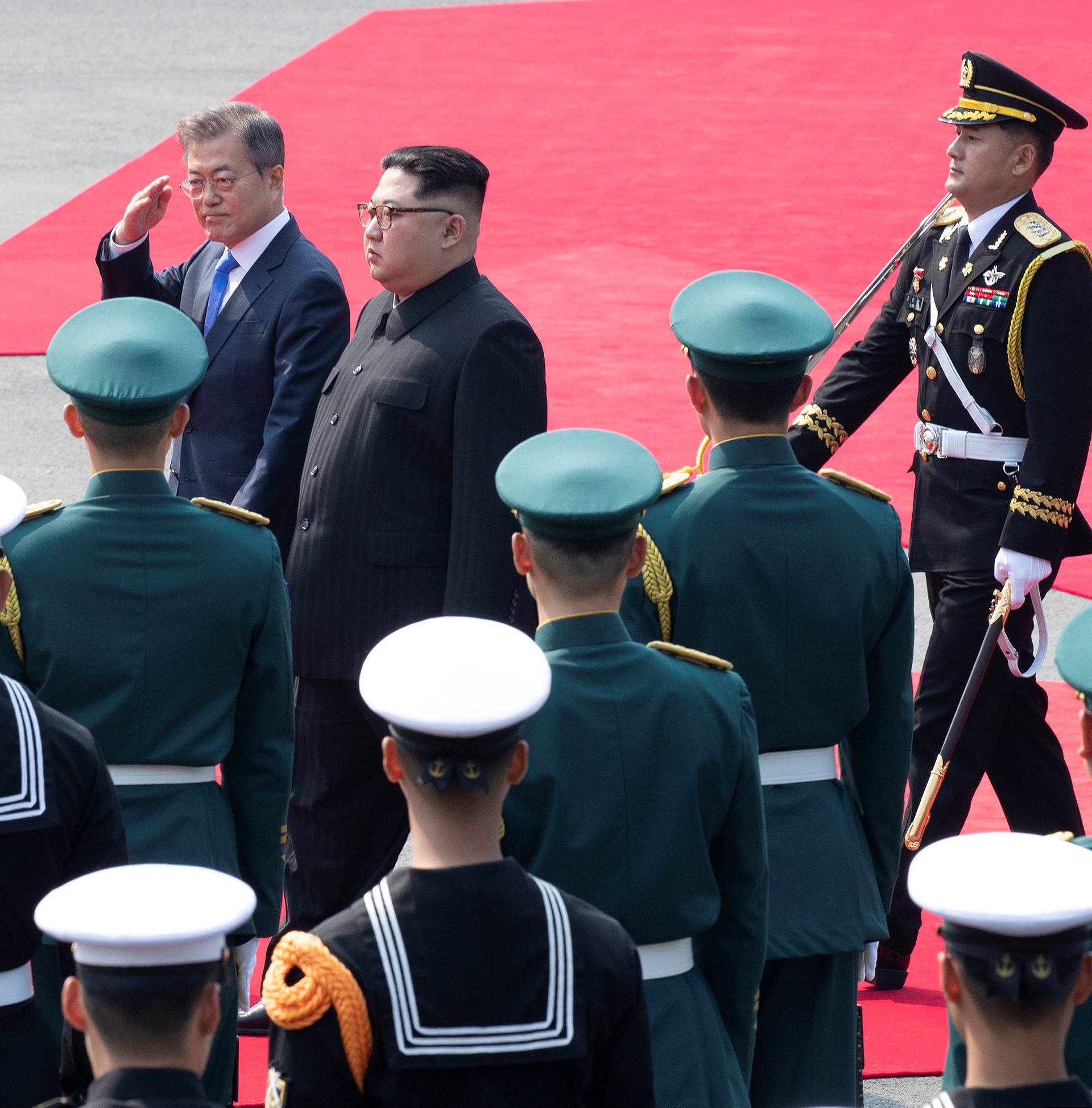 South Korean President Moon Jae-in attends a welcome ceremony with North Korean leader Kim Jong Un at the truce village of Panmunjom