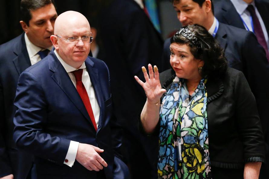 Pierce, UK Ambassador to the United Nations talks with Russian Ambassador to the United Nations Nebenzya before the emergency United Nations Security Council meeting on Syria at the U.N. headquarters in New York