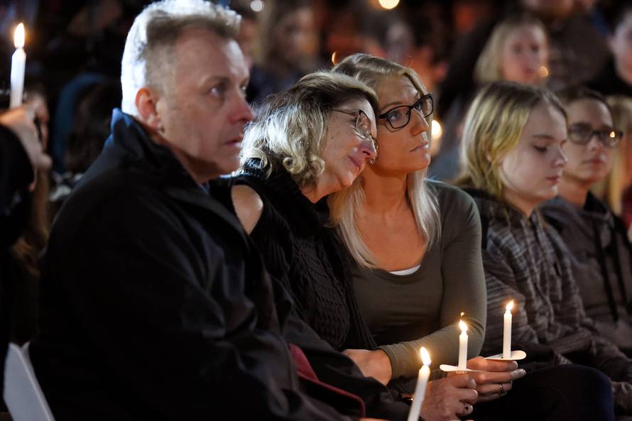 Jill Richardson Perez mother of Matt Coons mourns the loss of her son during a candle-light vigil for the victims of a limousine accident in Amsterdam New York