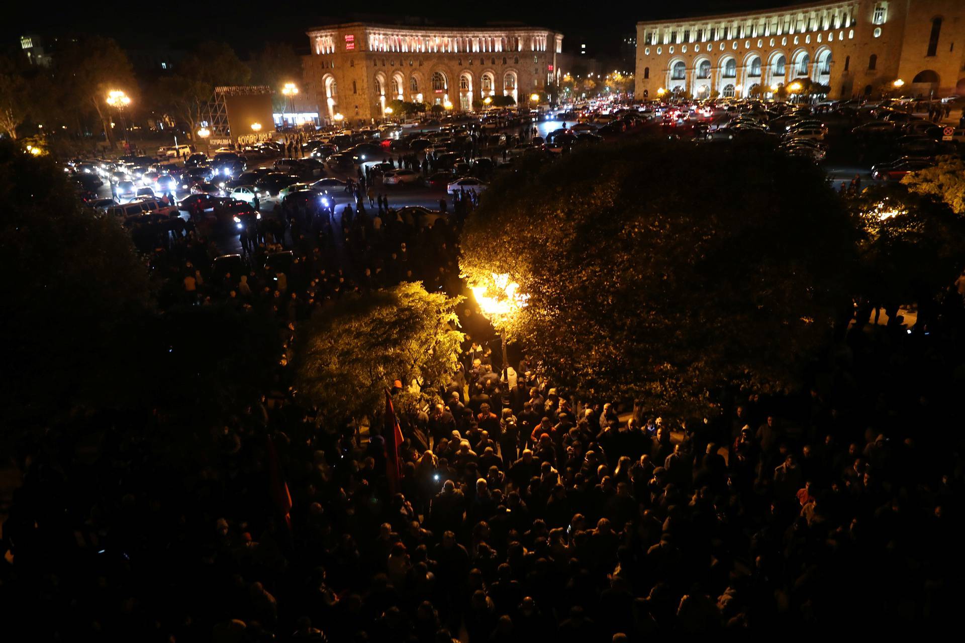 A general view of the crowd and vehicles outside the government house in Yerevan