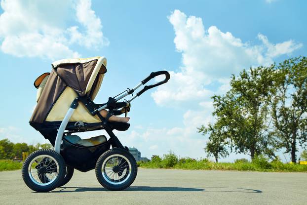 Baby,Stroller,On,A,Walk,In,The,Park,Summer,Day