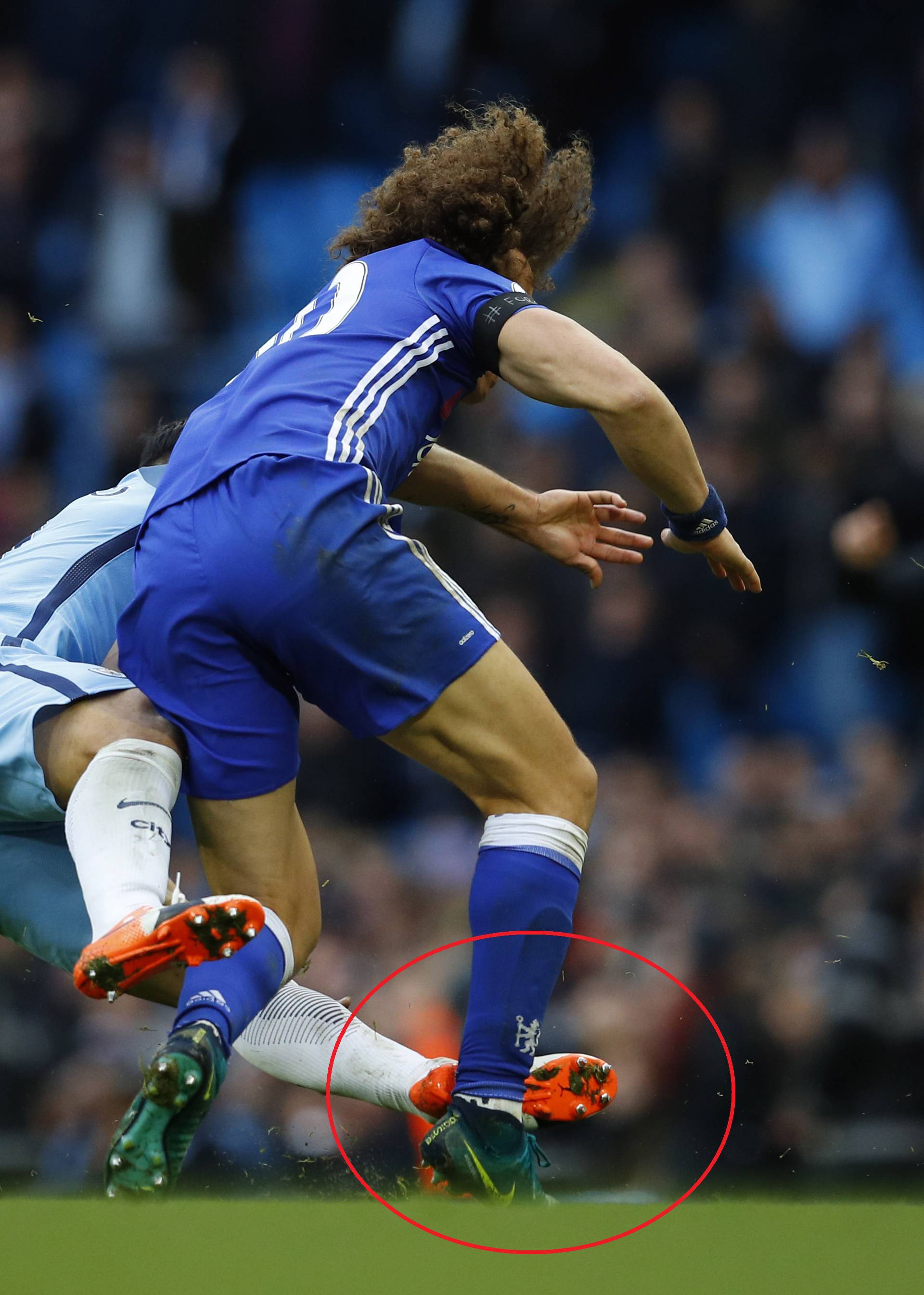 Manchester City's Sergio Aguero is sent off for this challenge on Chelsea's David Luiz