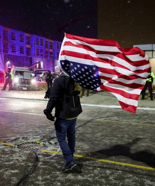 Protest outside the hotel where Bovino, who has been removed from his role, is reportedly staying, in Maple Grove