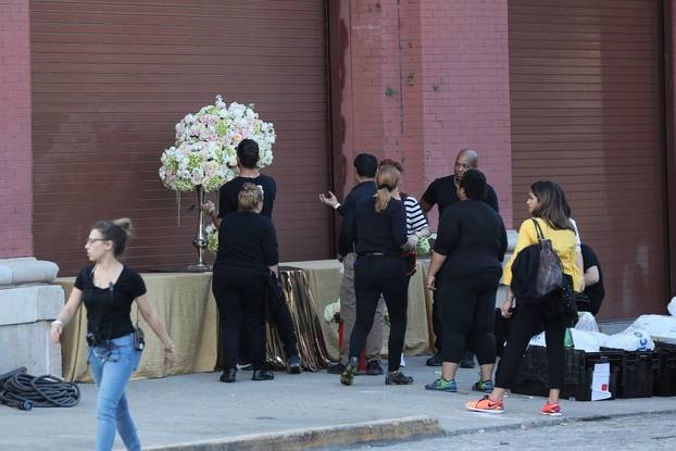 A wedding catering crew gets prepped for Serena William