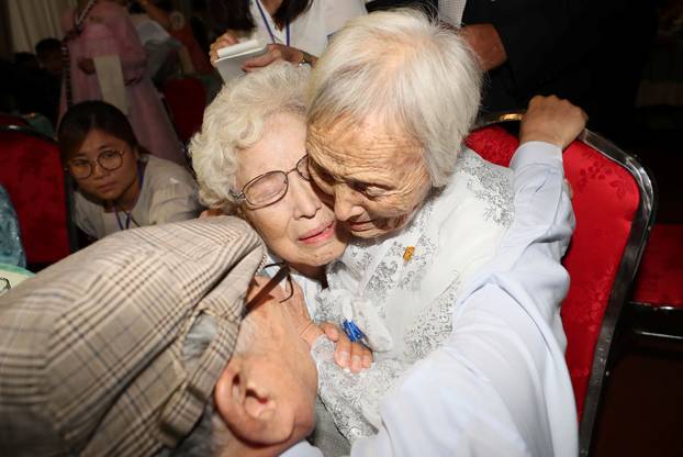 North and South Korean family members meet during a reunion at North Korea