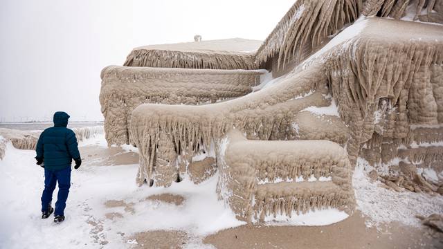 FILE PHOTO: Ice formed by the spray of Lake Erie waves in Hamburg, New York