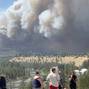Massive plumes of smoke rise from a wildfire in Spokane