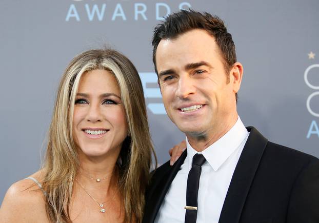 FILE PHOTO: Actors Jennifer Aniston and Justin Theroux arrive at the 21st Annual Critics