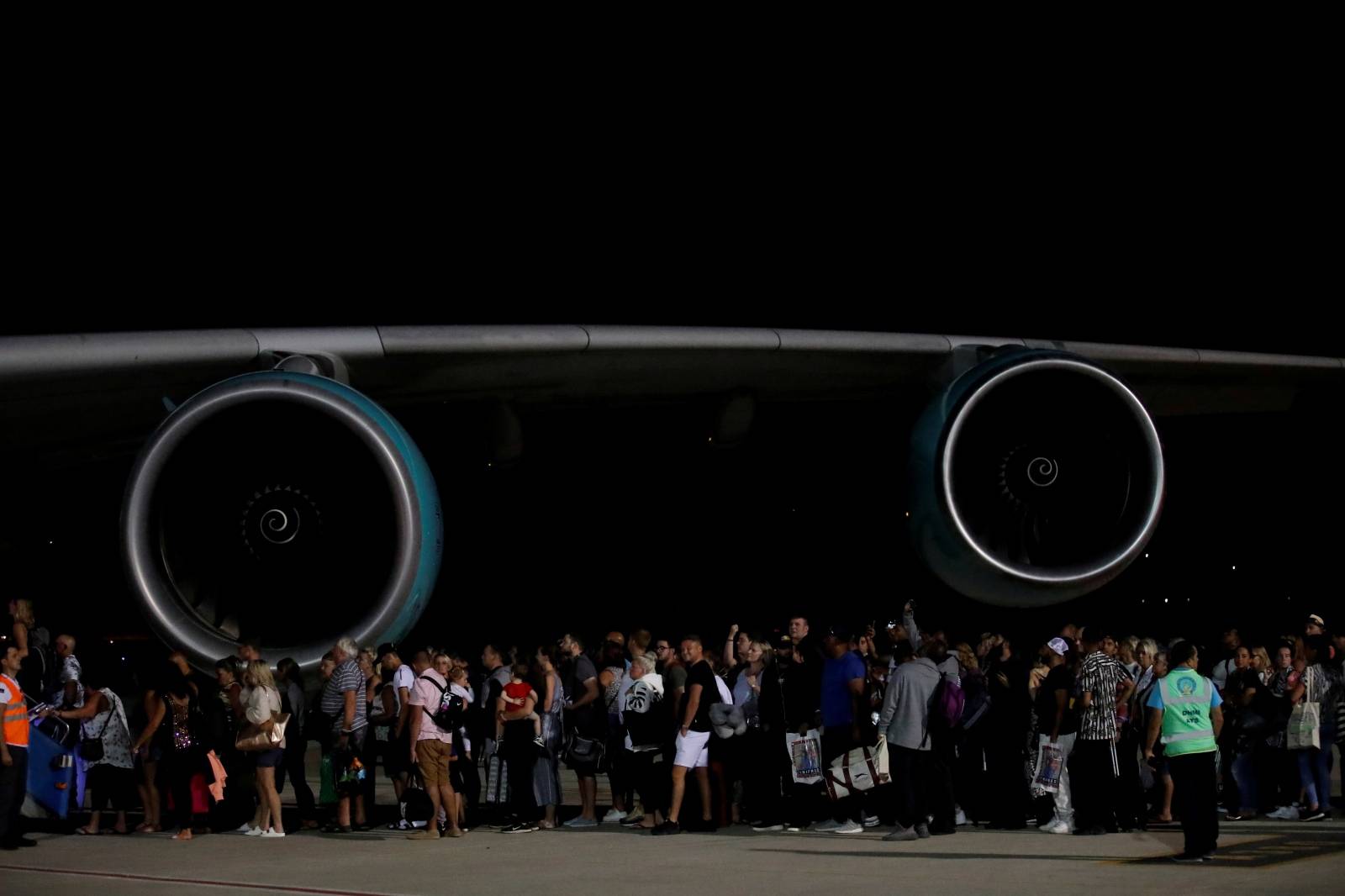 British passengers board an Airbus A380 airliner that is being used for transporting Thomas Cook customers at Dalaman Airport