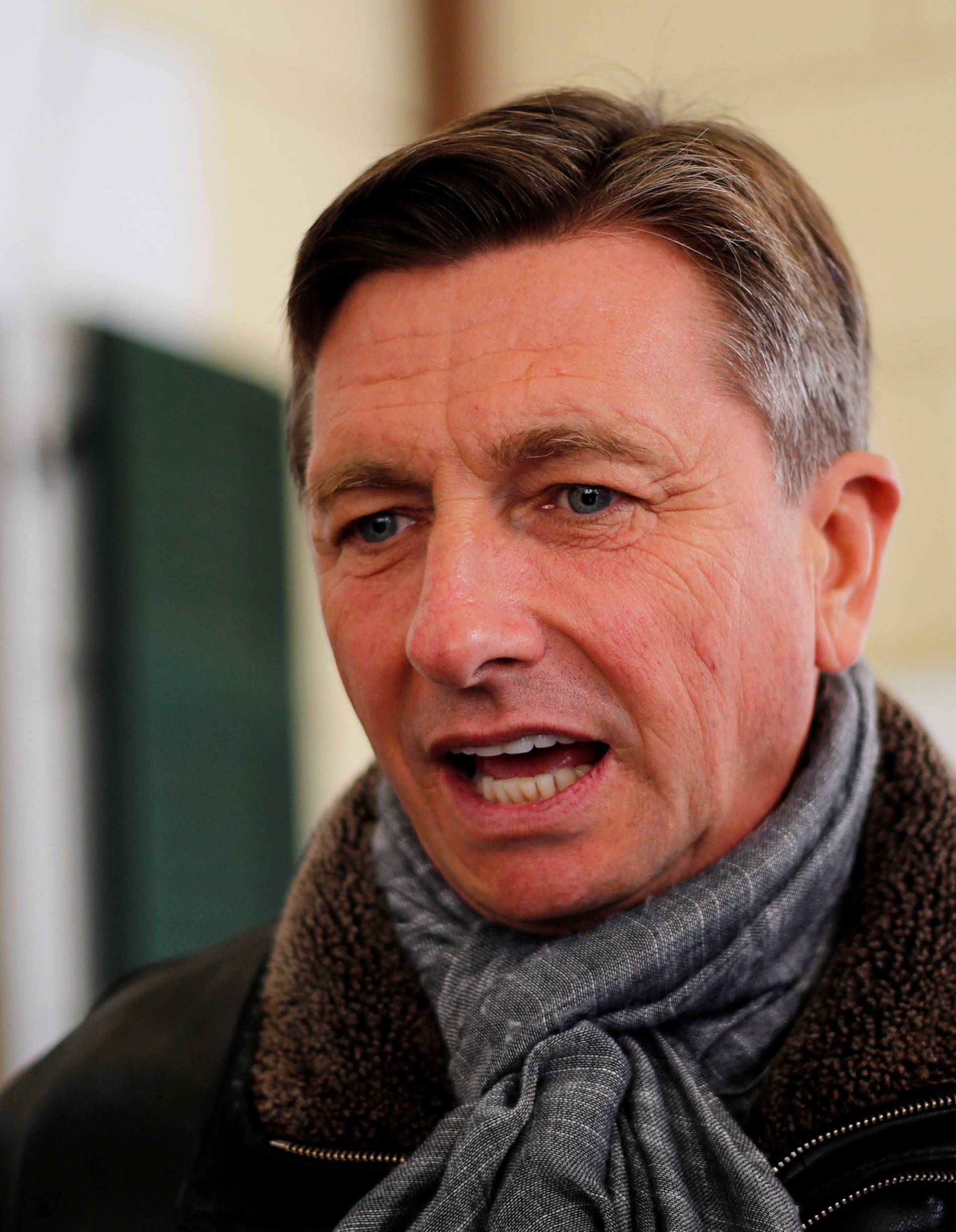 Current President and presidential candidate Borut Pahor speaks to the press after voting at a polling station during the second round of the presidential election in Sempeter pri Novi Gorici