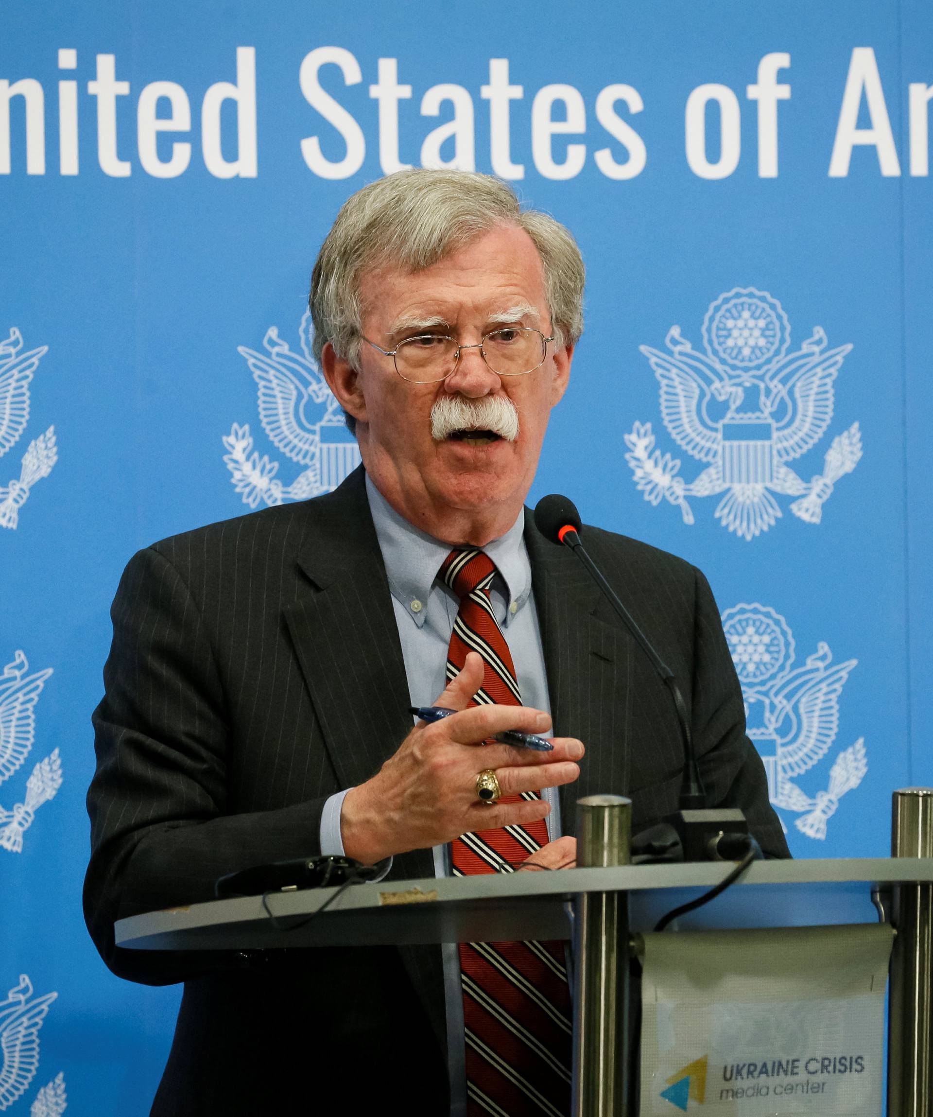 U.S. President Donald Trump's national security adviser John Bolton speaks at a news conference in Kiev