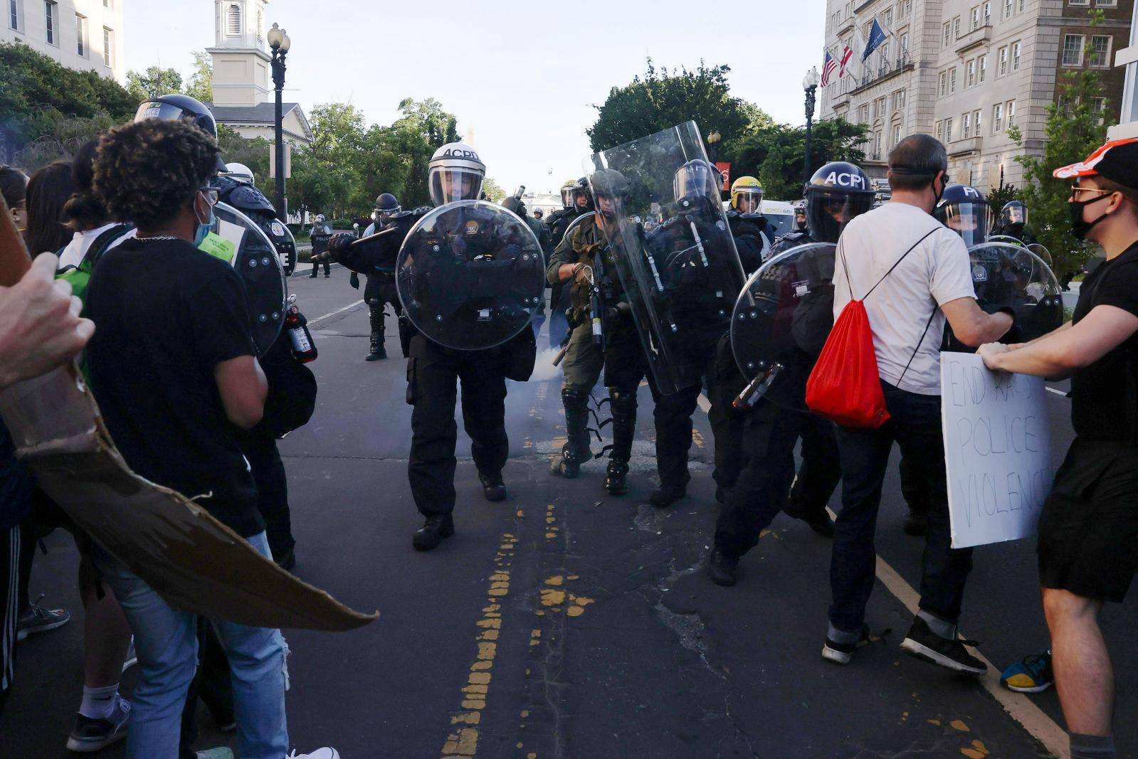 Police move in to eject protesters from the vicinity of St. John’s Church before U.S. President Donald Trump paid a visit, during demonstrations against the death in Minneapolis police custody of George Floyd, near the White House in Washington