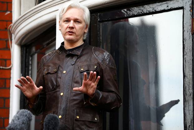 FILE PHOTO: WikiLeaks founder Julian Assange is seen on the balcony of the Ecuadorian Embassy in London, Britain