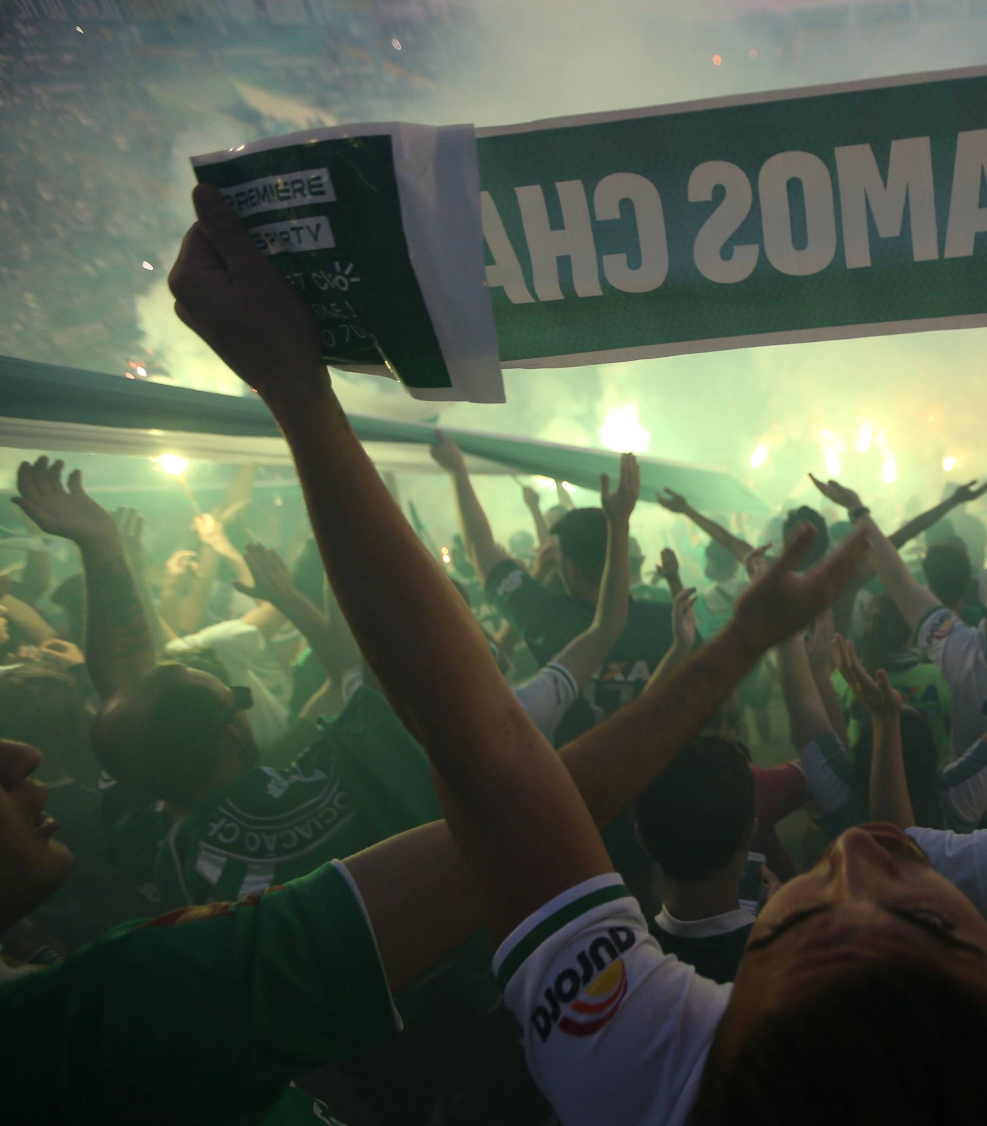 Fans of Chapecoense soccer team pay tribute to Chapecoense's players at the Arena Conda stadium in Chapeco