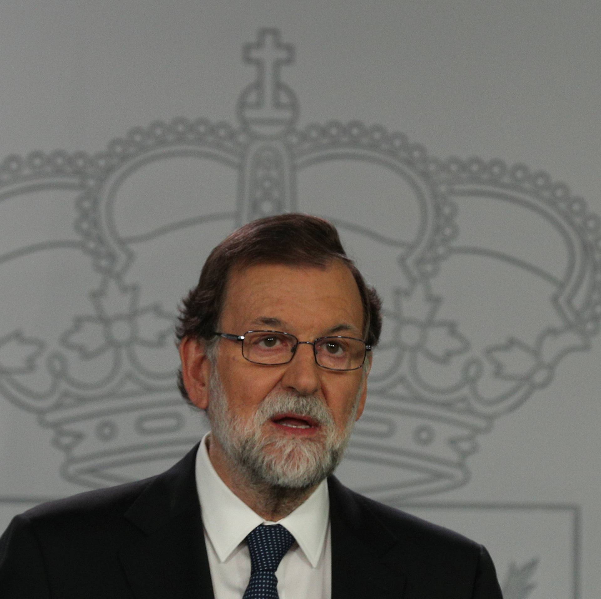 Spain's PM Rajoy delivers an statement at the Moncloa Palace in Madrid