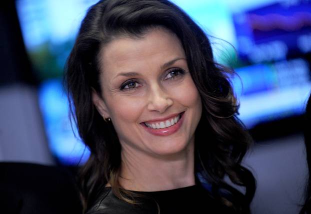 Bridget Moynahan Rings The Closing Bell At The NYSE - NYC