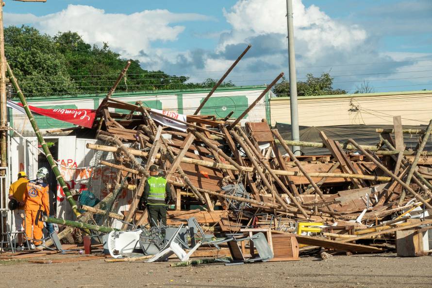 Debris is pictured after part of a grandstand collapsed in a bullring, during the celebration of the San Pedro festivities, in El Espinal