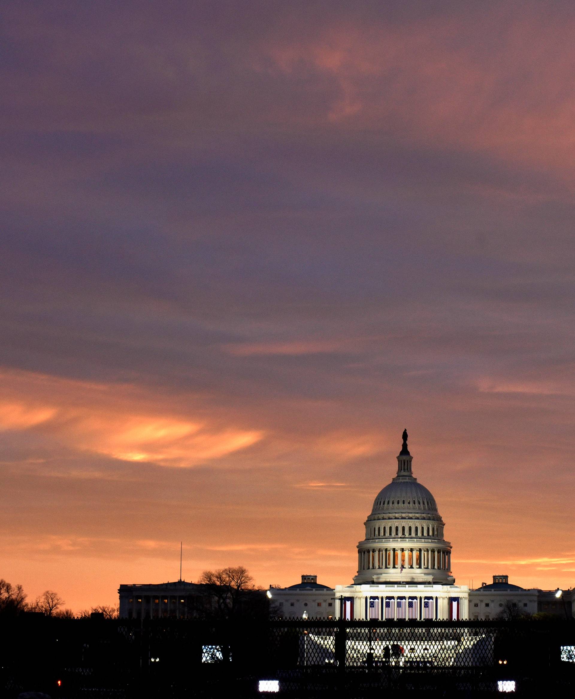 The sun rises over the U.S. Capitol on the National Mall before U.S. President-elect Donald Trump is to be sworn in in Washington