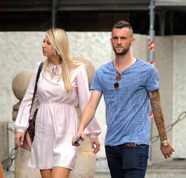 Milan, Marcelo BrozoviÄ and girlfriend strolling downtown