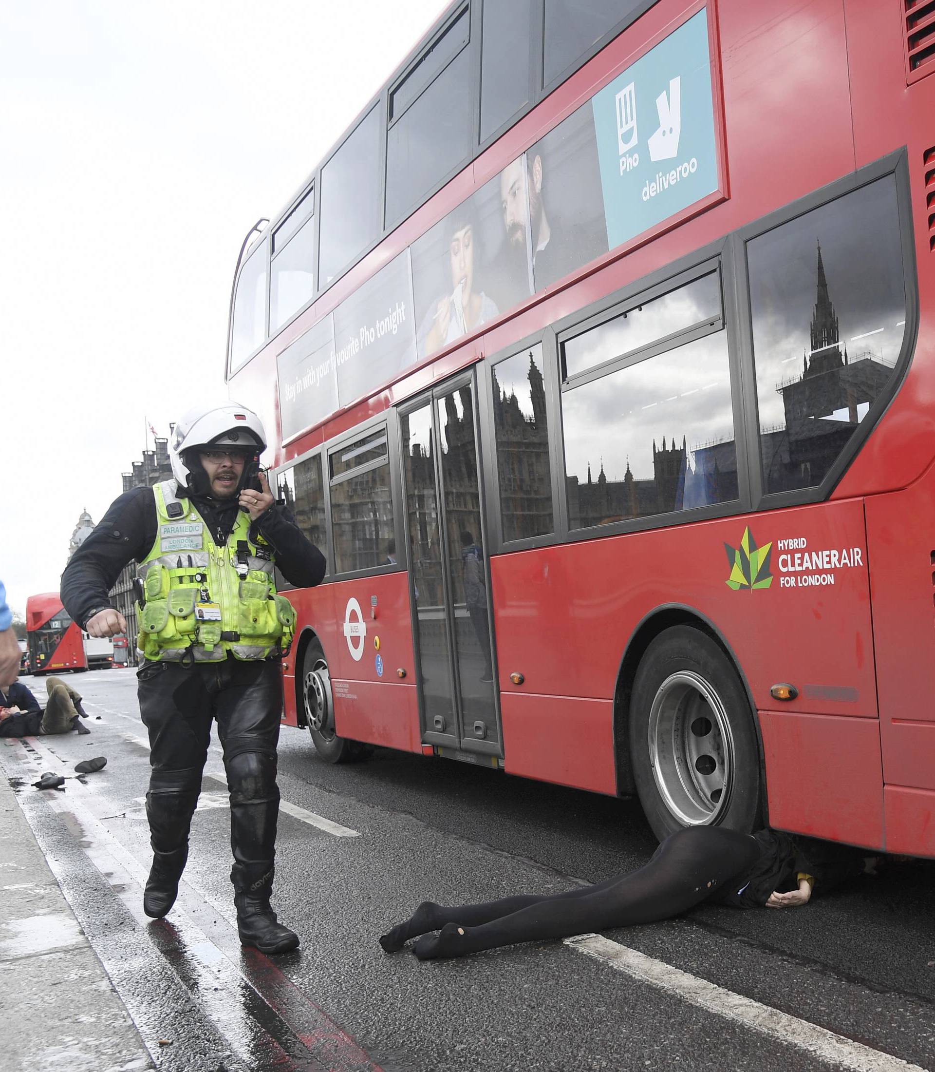A woman lies injured after an incident on Westminster Bridge in London