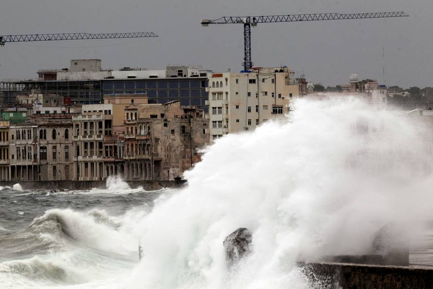 FILE PHOTO: Waves crash against the seafront boulevard El Malecon ahead of the passing of Hurricane Irma, in Havana