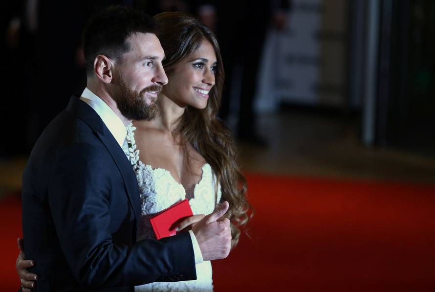 Argentine soccer player Lionel Messi and Antonela Roccuzzo pose at their wedding in Rosario