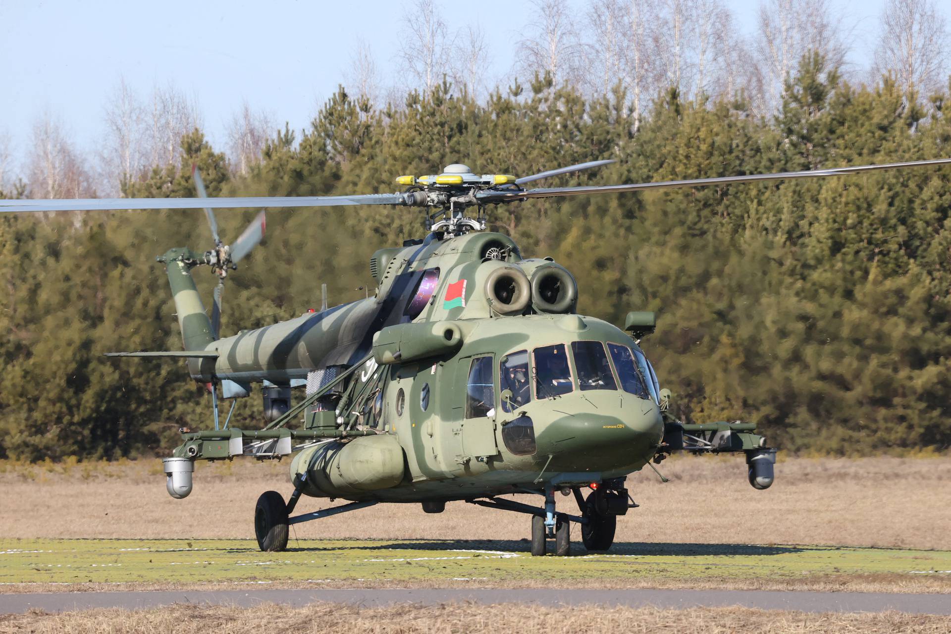 Members of the Ukrainian delegation arrive for talks with Russian representatives in the Gomel region