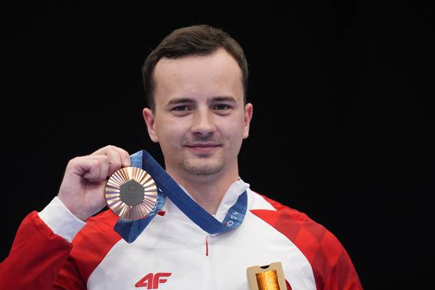 Shooting - 10m Air Rifle Men's Victory Ceremony