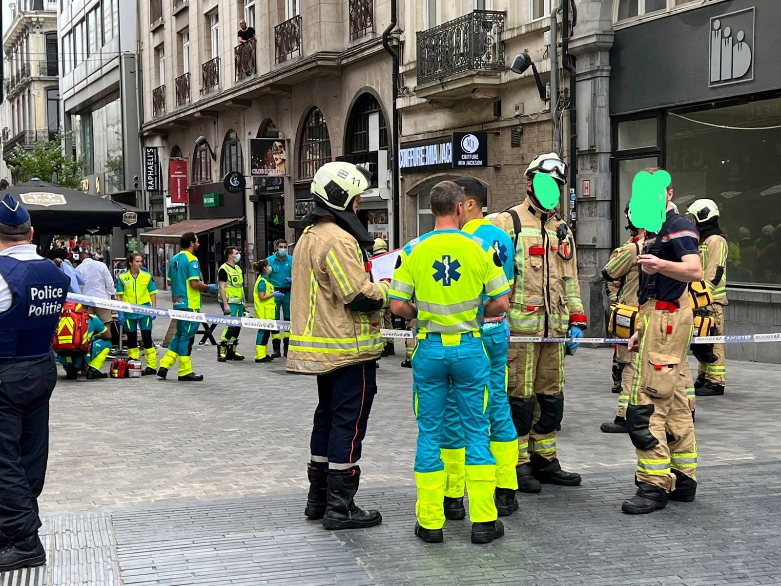 A van drives into a cafe terrace in central Brussels