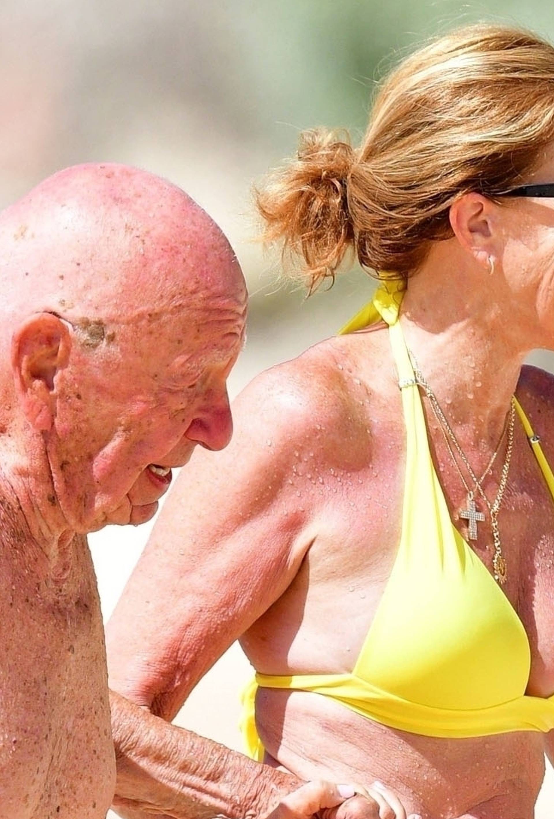 *PREMIUM-EXCLUSIVE* *MUST CALL FOR PRICING* The Australian-American business magnate Rupert Murdoch laps up the hot Caribbean sunshine with his scantily-clad mystery woman and billionaire pal Anthony Bamford out on the beaches of Barbados.