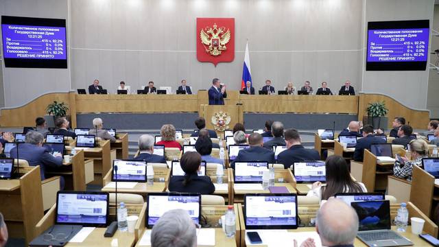 Members of Russia's State Duma lower house of parliament attend a plenary session in Moscow