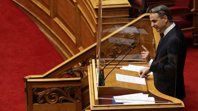 FILE PHOTO: Greek Prime Minister Kyriakos Mitsotakis addresses lawmakers in Athens