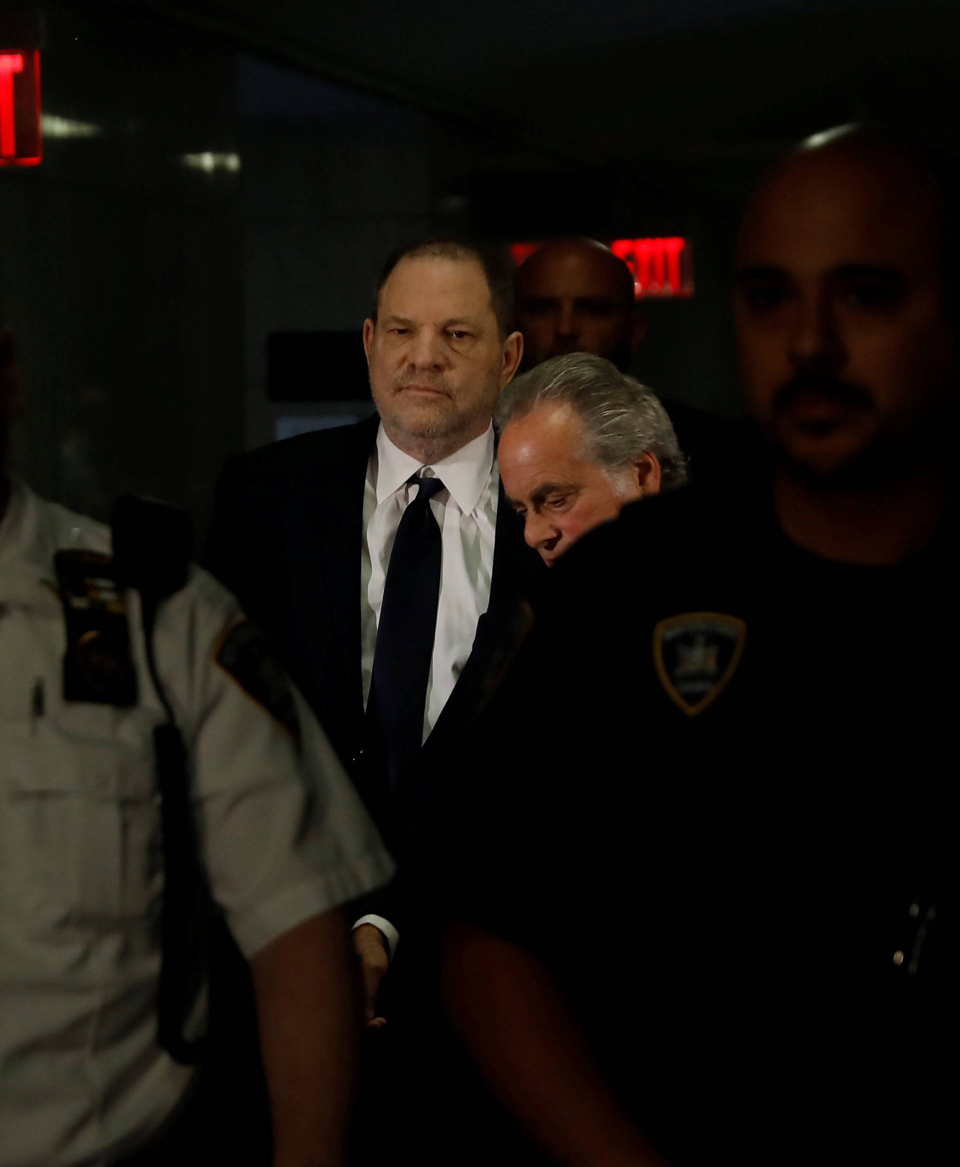 Film producer Harvey Weinstein arrives for his arraignment at Manhattan Criminal Court in New York