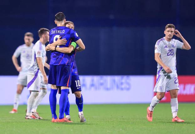 Slavlje hrvatskih igrača nakon pobjede u suretu sa Škotskom