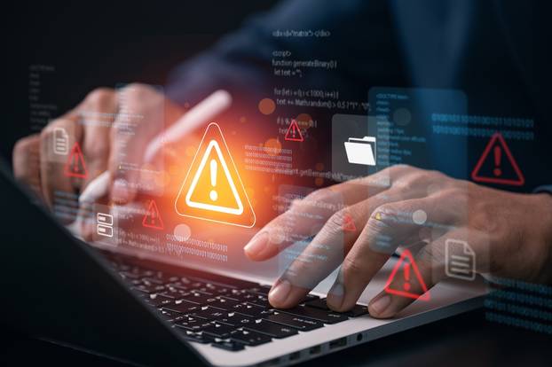Cybersecurity,Threat,Warning,Concept,With,Developer,Analyzing,System,Code,On
