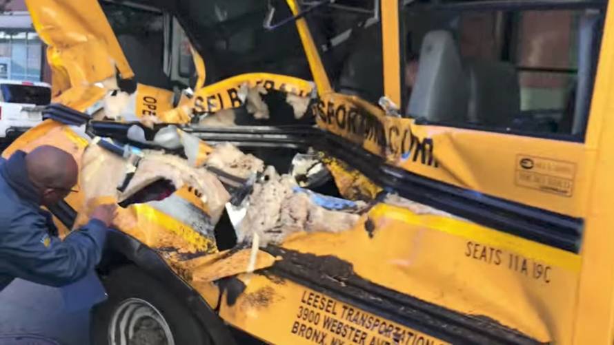 A damaged school bus is seen at the scene of a pickup truck attack in Manhattan, New York