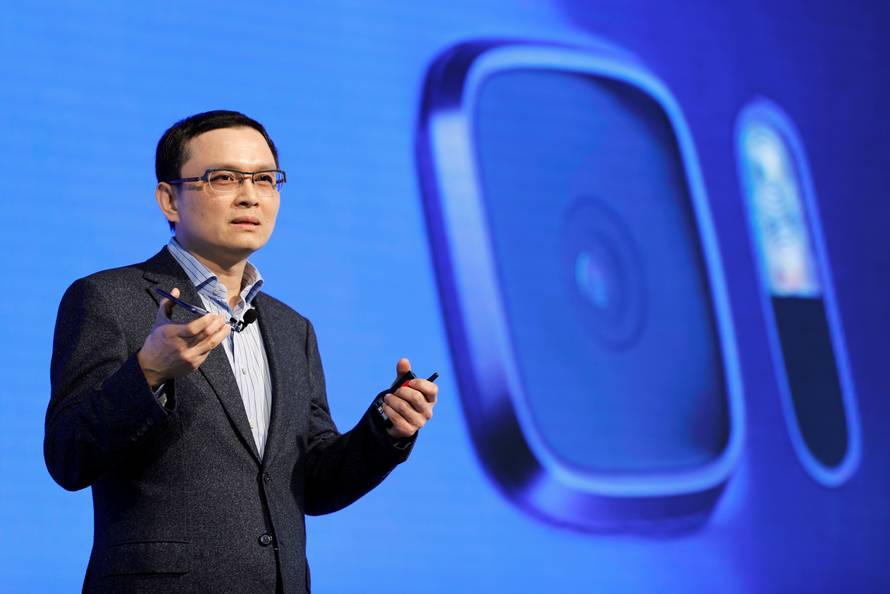 Chang Chia-Lin, President of Global Sales of HTC speaks holding a new smartphone "U Ultra" during its launch event in Taipei