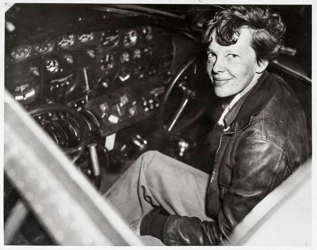 Amelia Earhart (1897-circa 2nd July 1937), American aviation pioneer in the cockpit of an Electra airplane, 20th Century photograph, by Acme Newspictures (New York), 1937