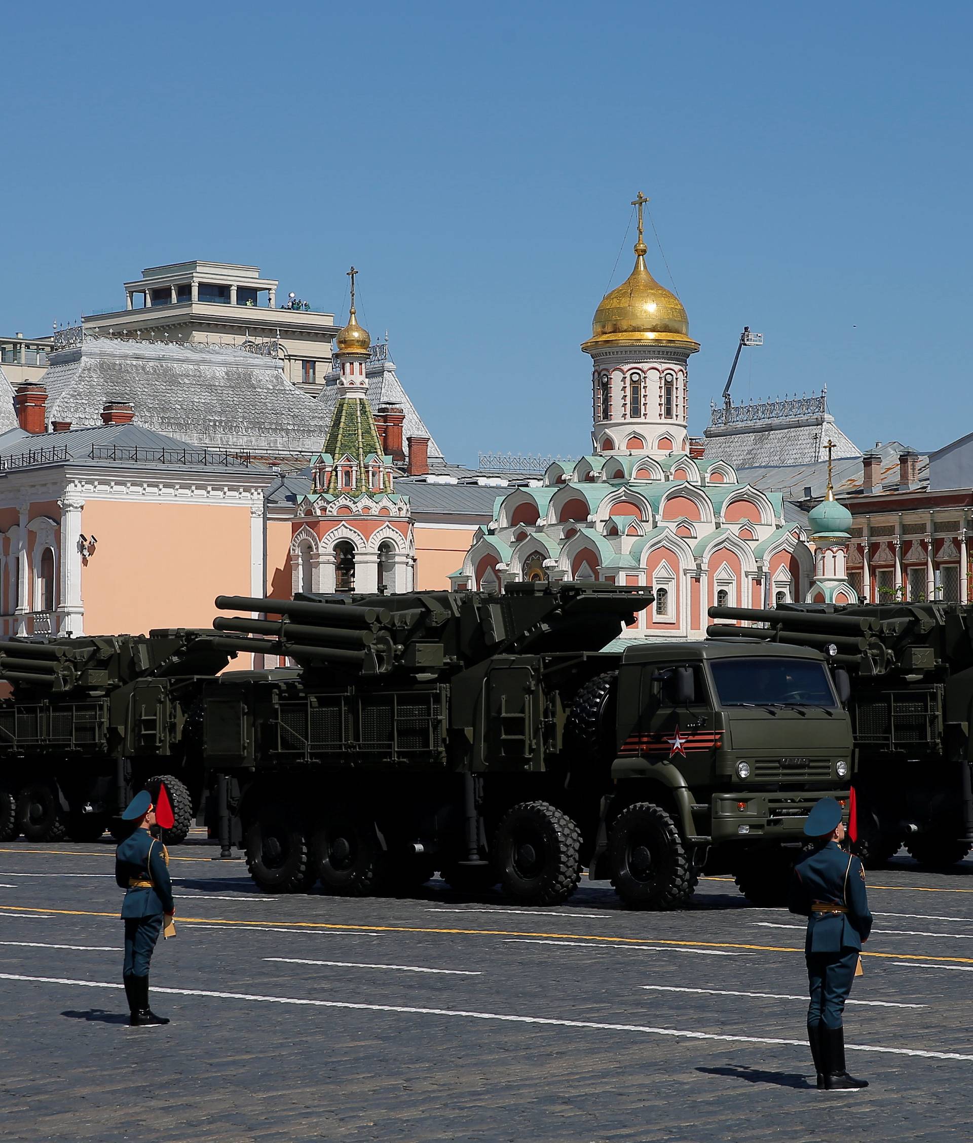 Russian servicemen drive military vehicles during the Victory Day parade at Red Square in Moscow