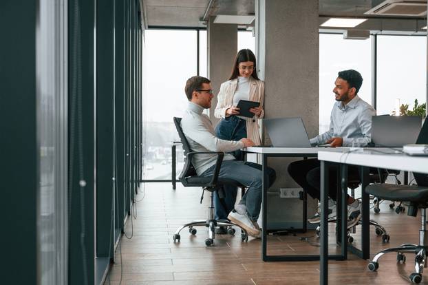 Smiling,And,Talking.,Men,And,Woman,Are,Working,In,The