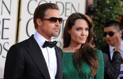 O haljinama Ageline Jolie za crveni tepih odlučuje Brad Pitt