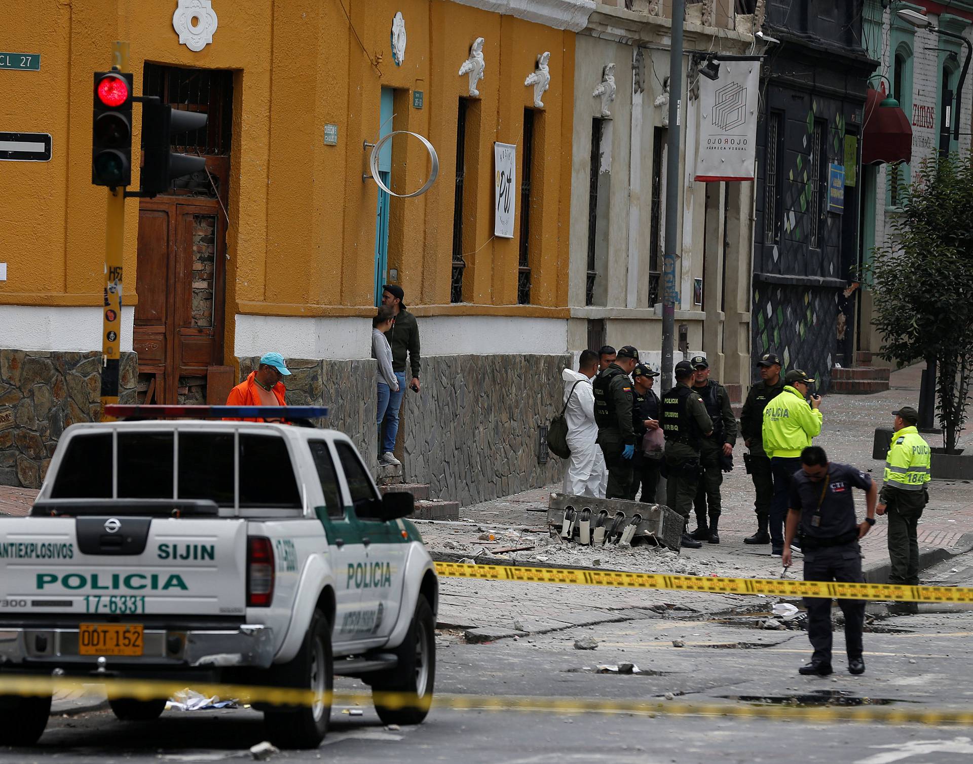 Police work the scene where an explosion occurred near Bogota's bullring