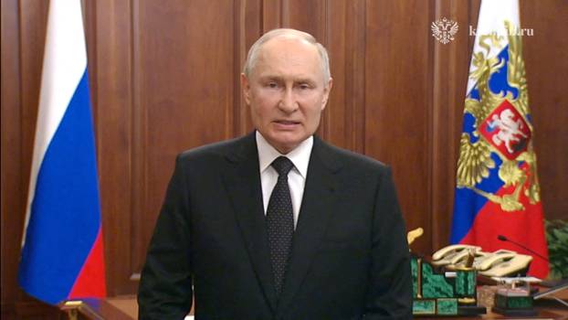 Russian President Vladimir Putin gives a televised address in Moscow