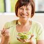 Older woman with healthy food indoors