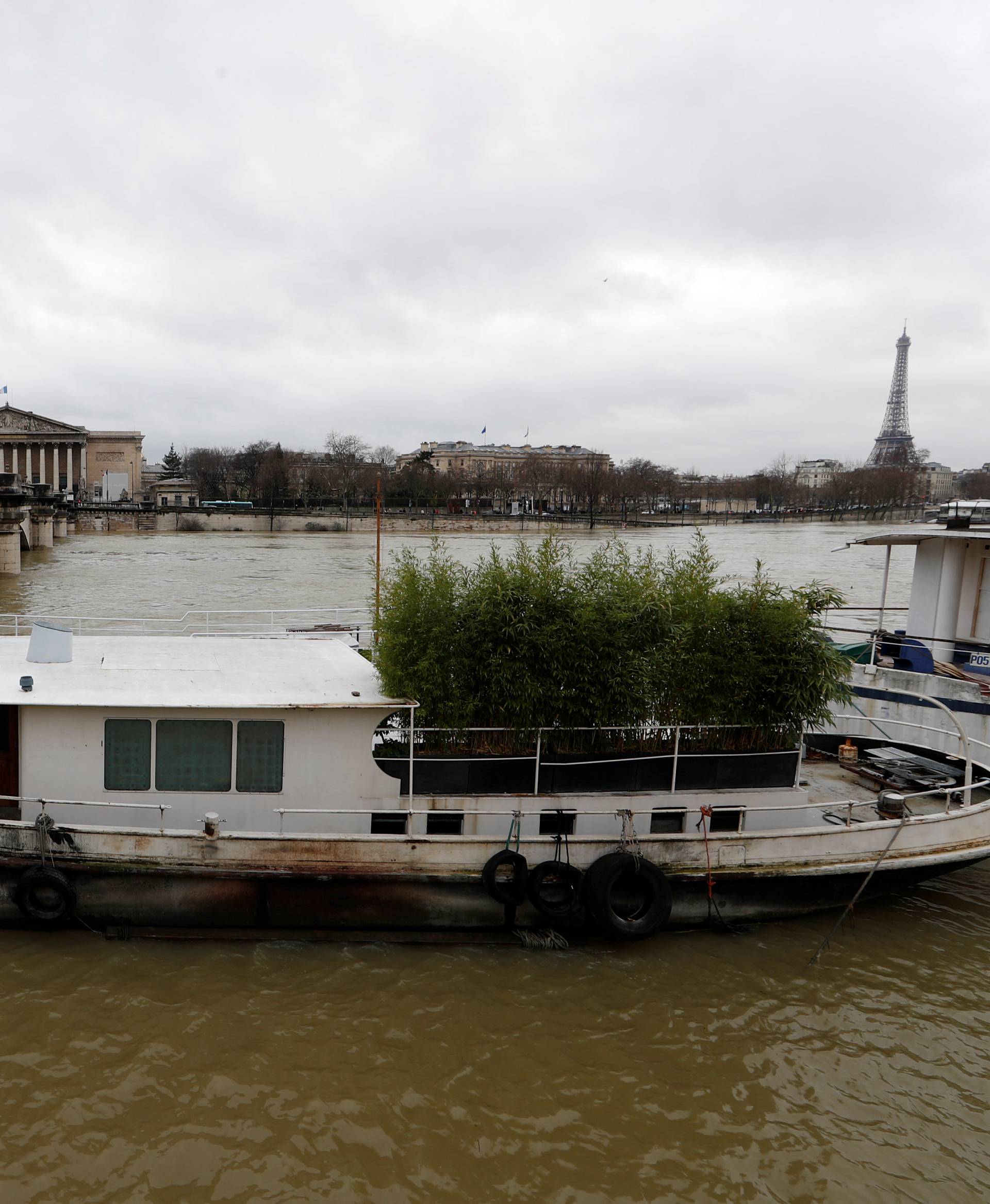 A view shows a peniche boat that is moored along the flooded banks of the River Seine after days of almost non-stop rain caused flooding in the country in Paris